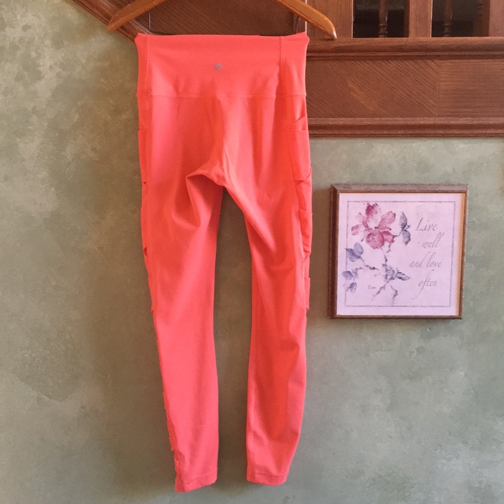 Lululemon Rise and Flow pants with mesh sides